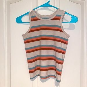 Beige tank top with blue, orange and dark orange stripes